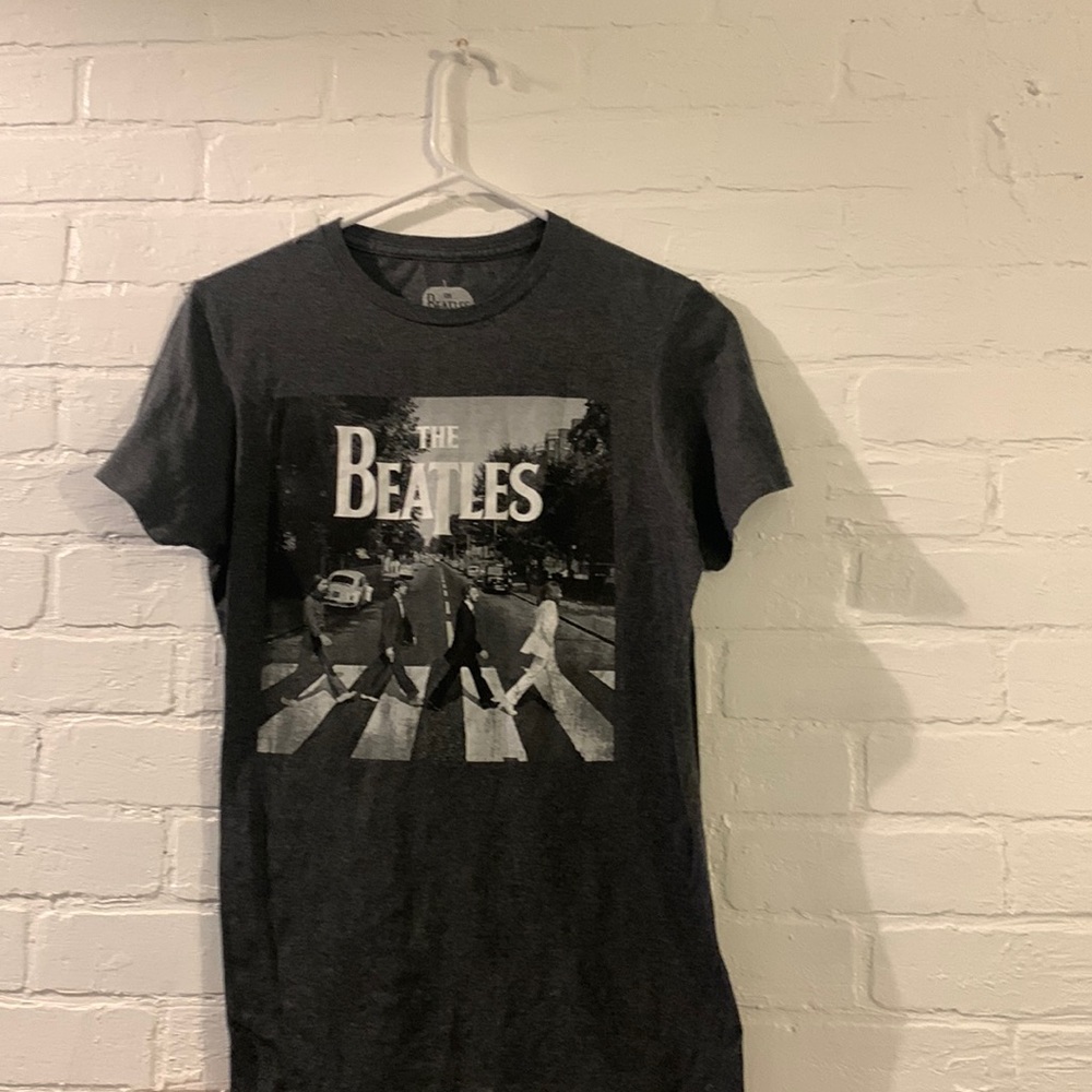 we are selling a Beatles band tee